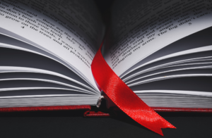 image of open book with red bookmark